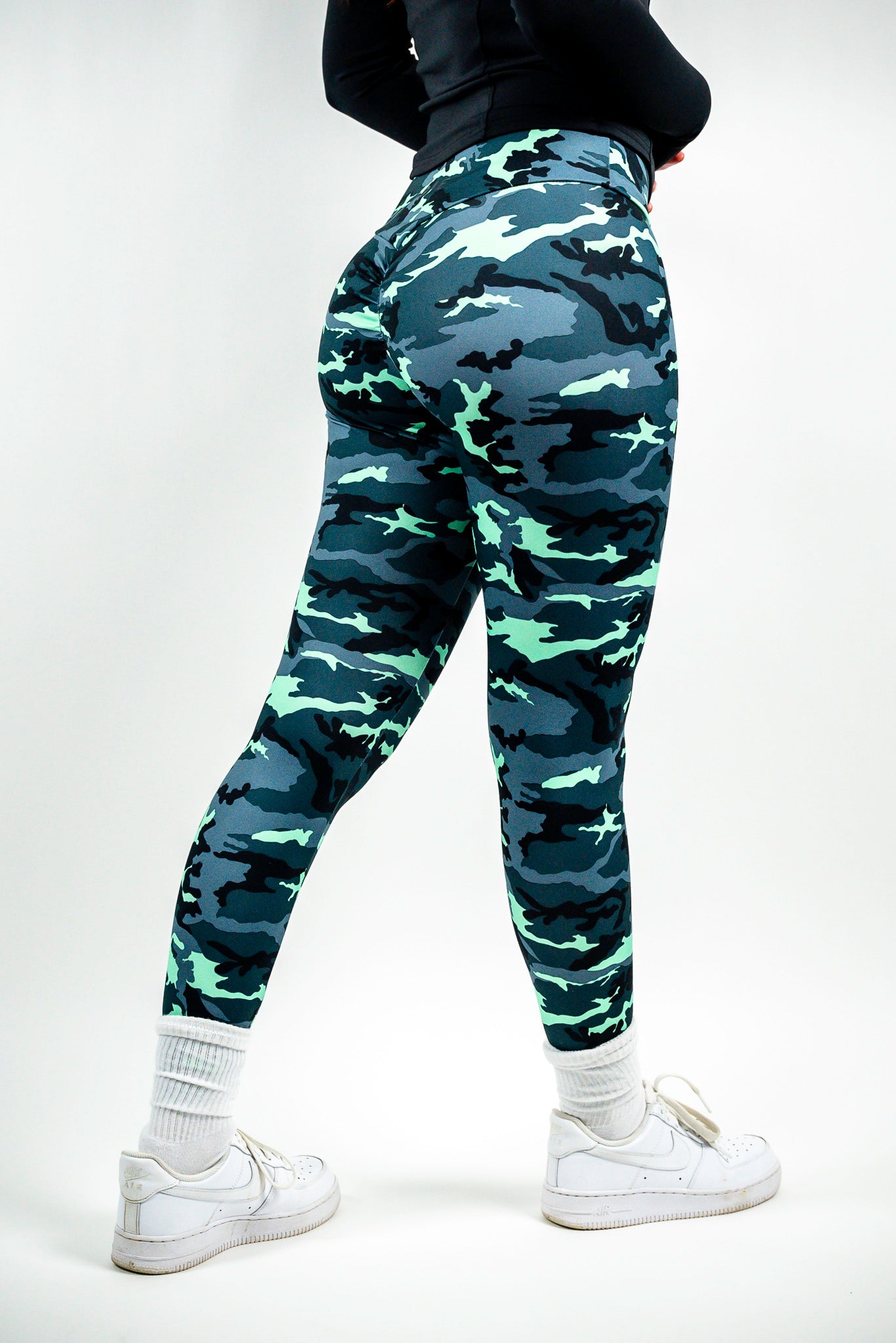 Beautiful Zoe is wearing size small mint camo leggings. Hips are 39 inches and waist 27 inches. Mint camo fabric runs smaller in size, so size up if in between sizes.